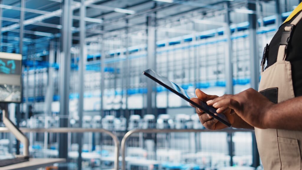 smart factory expert using digital device app test automated systems closeup 1
